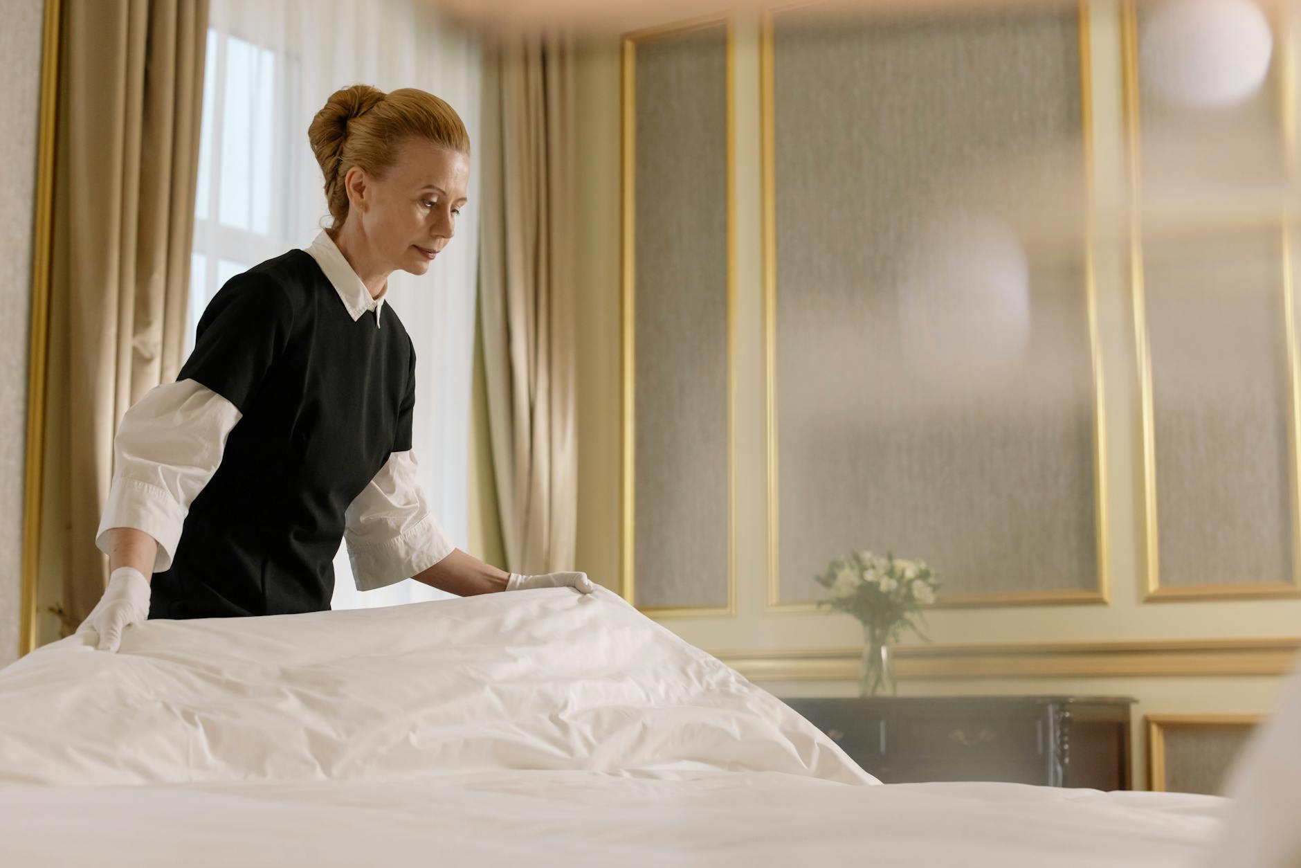 Photo by cottonbro studio on <a href="https://www.pexels.com/photo/woman-fixing-the-bed-6466492/" rel="nofollow">Pexels.com</a>