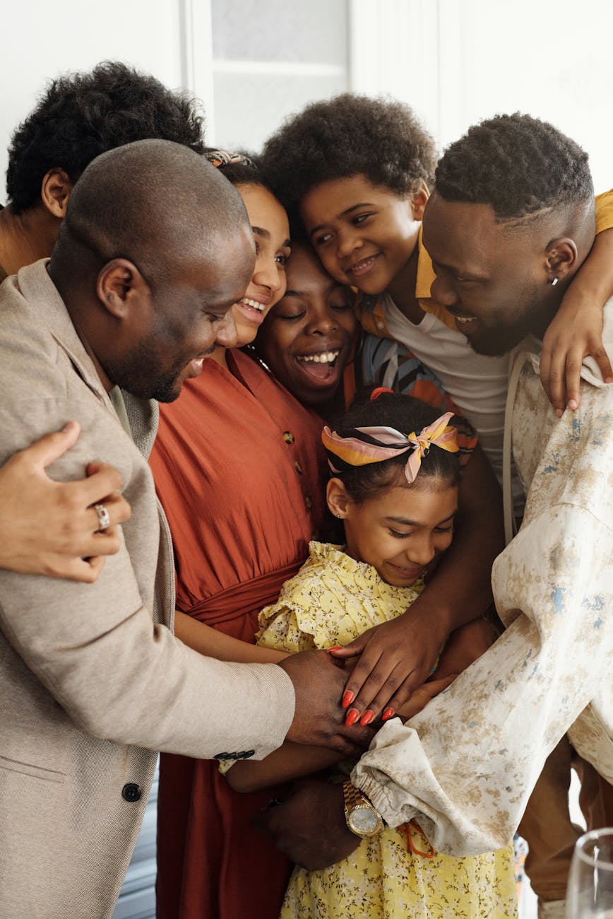 Photo by August de Richelieu on <a href="https://www.pexels.com/photo/family-gathering-for-a-group-hug-4262424/" rel="nofollow">Pexels.com</a>