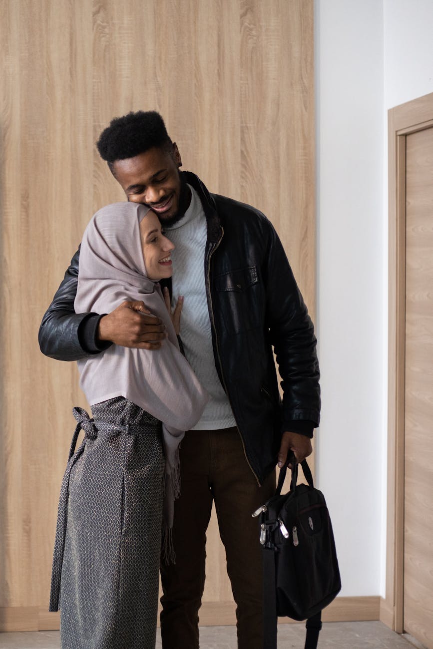 Photo by Monstera Production on <a href="https://www.pexels.com/photo/happy-diverse-couple-hugging-at-home-5996832/" rel="nofollow">Pexels.com</a>