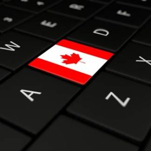 3D rendering close up of Canada flag button on laptop keyboard.