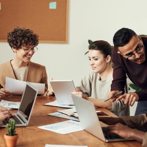 Photo by fauxels on <a href="https://www.pexels.com/photo/group-of-people-gathered-around-wooden-table-3184360/" rel="nofollow">Pexels.com</a>