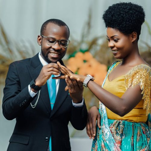 Photo by Chris wade NTEZICIMPA on <a href="https://www.pexels.com/photo/joyful-engagement-ceremony-with-ring-exchange-32660520/" rel="nofollow">Pexels.com</a>