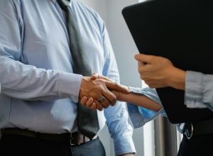 Photo by Sora Shimazaki on <a href="https://www.pexels.com/photo/man-and-woman-shaking-hands-in-office-5668842/" rel="nofollow">Pexels.com</a>