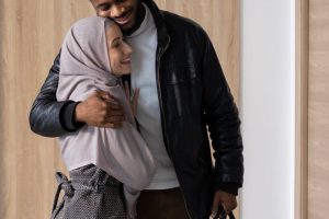 Photo by Monstera Production on <a href="https://www.pexels.com/photo/happy-diverse-couple-hugging-at-home-5996832/" rel="nofollow">Pexels.com</a>